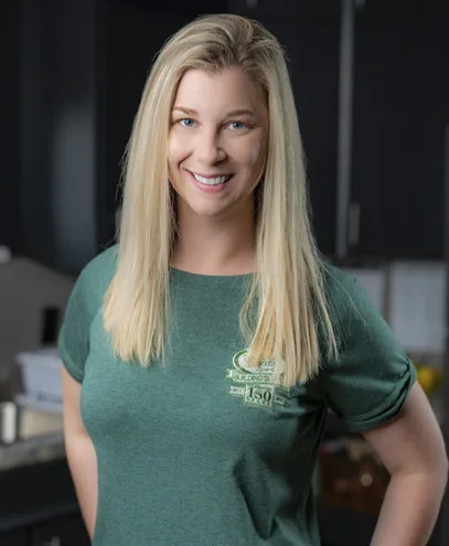 Photo of a female worker with a Lincoln Davies shirt on.