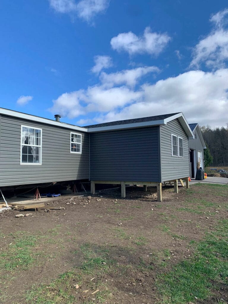 Photo of outside of a home under construction.