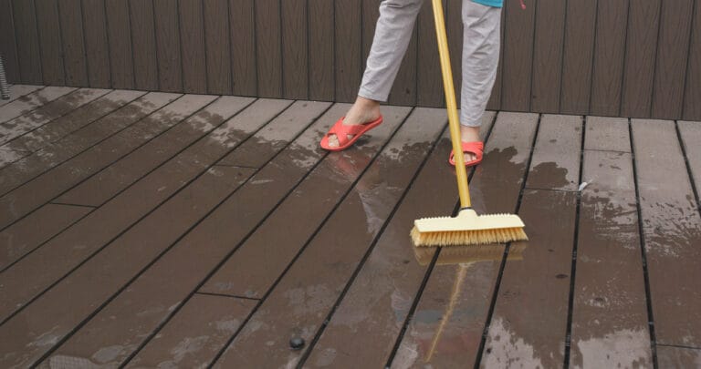 Cleaning the floor with yellow brush